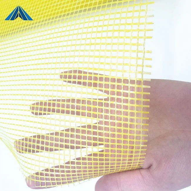 What are the benefits of alkali-free glass fiber yarn as a protective material?